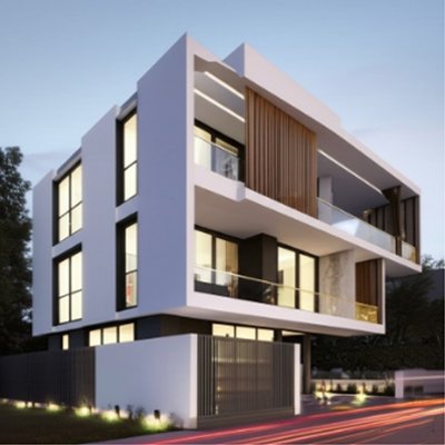 A stunning contemporary residential building designed by Anuda Architect in Jaipur, featuring a bold, angular roofline, dark grey paneling, and warm interior lighting at dusk, surrounded by lush green landscaping.